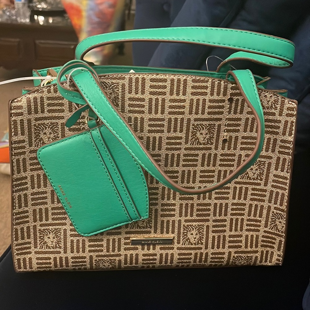 New with tags Anne Klein Curved Satchel.
